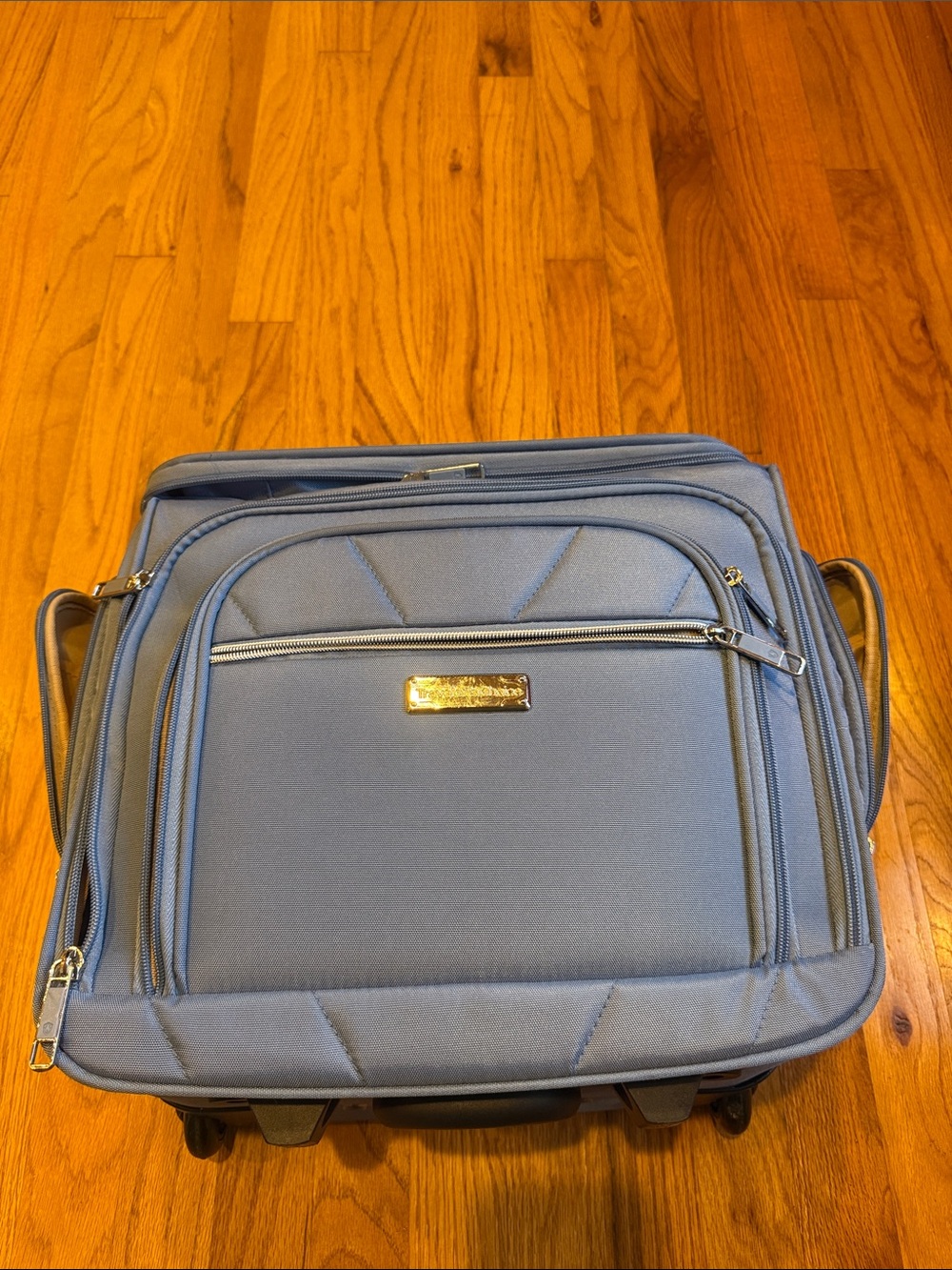 Light Blue Men's Rolling Carry-On Travel Bag with Front Pocket